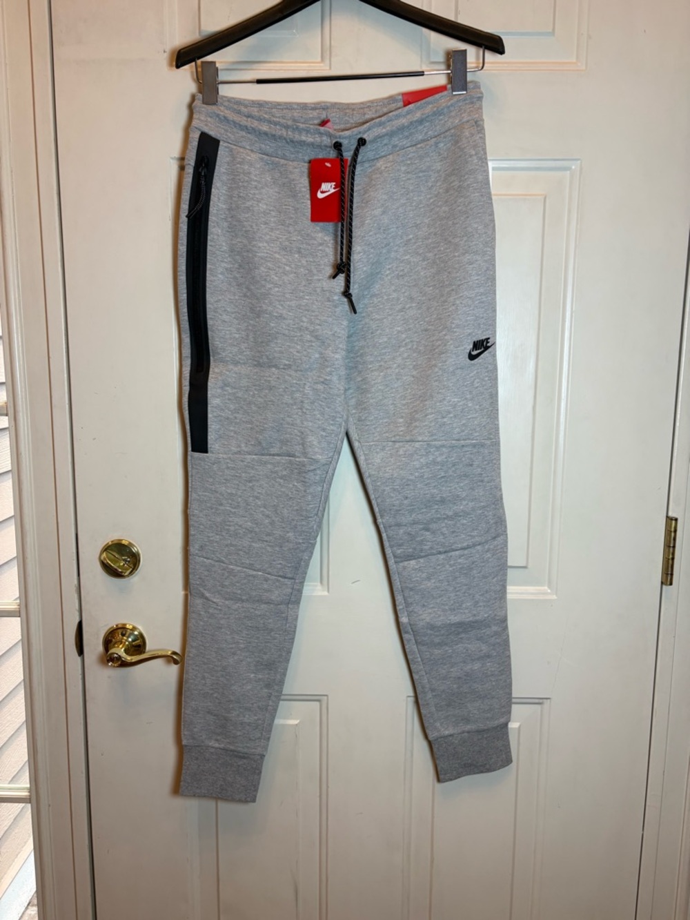 Nike Light Gray Kids' Fleece Joggers with Black Accents